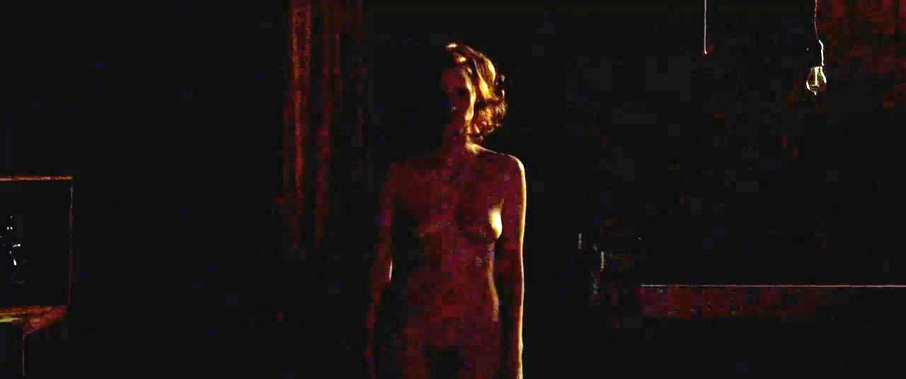 In this scene we see Jessica Chastain getting out of bed and removing her n...