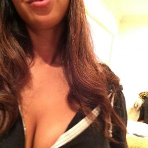 Jackie Cruz with her tits in a deep cleavage