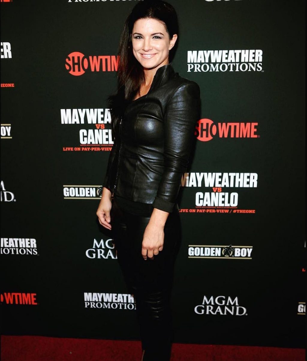 Gina Carano sexy in leather jacket