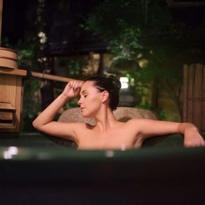 Meg Turney topless in bath tub