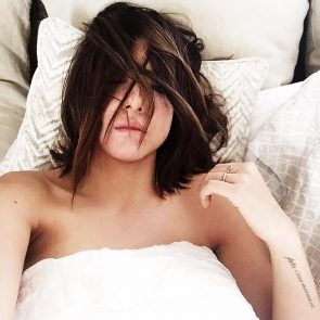 Chloe Bennett topless in bed