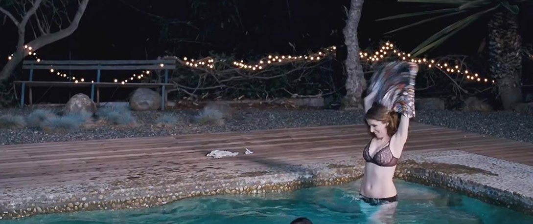 Anna Kendrick naked in a pool
