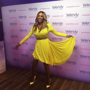 Wendy Williams in a bright yellow dress