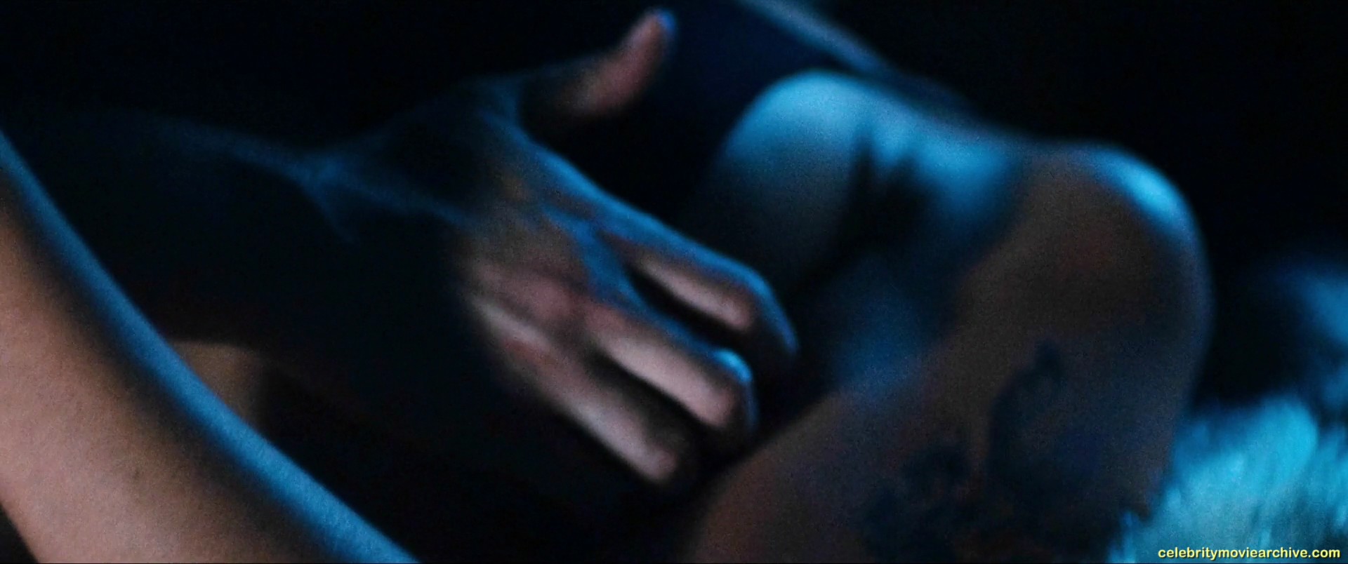 In this scene we see Serinda Swan on her back under some man in a sex scene...