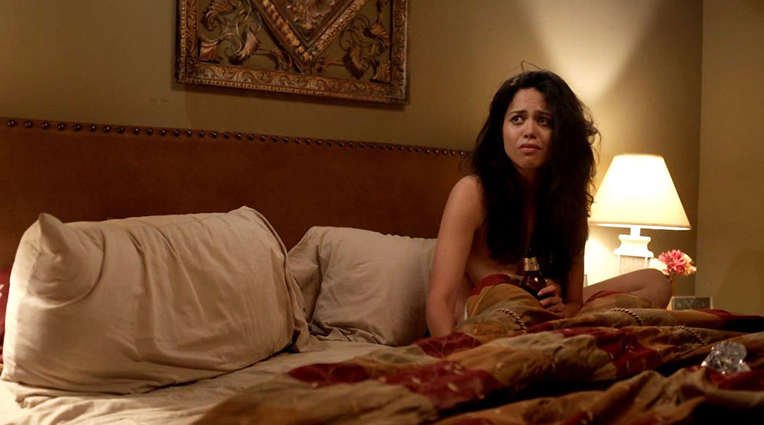 We can, in it, see Alyssa Diaz as she’s sitting in bed next to a man, her c...