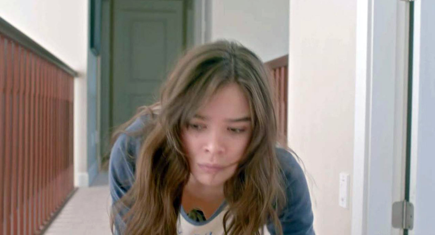 Hailee Steinfeld crawling around with her shirt hanging low on the ground, ...